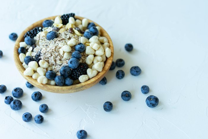 A nutrient-rich fiber-forward breakfast bowl with oats, blueberries, and whole grains for digestive wellness